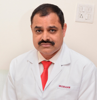 Dr. Suresh Ahlawat — internationally qualified implantologist BDS MDS DNB USA at Muskaan Dentals Gurgaon